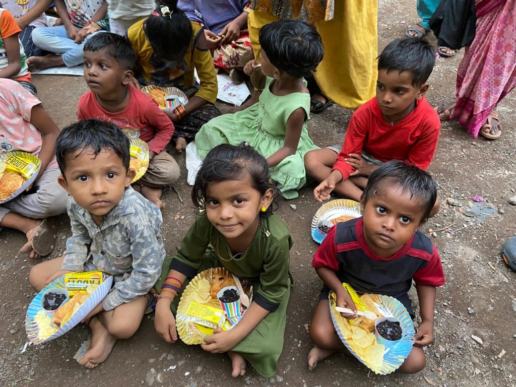 Feeding program conducted on 18 Oct 2024 for the slum children of Koperkhairane.